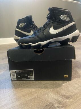 Jordan Kids Black and White High-Top Sneakers